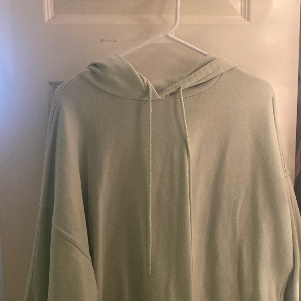 mint green sweatshirt